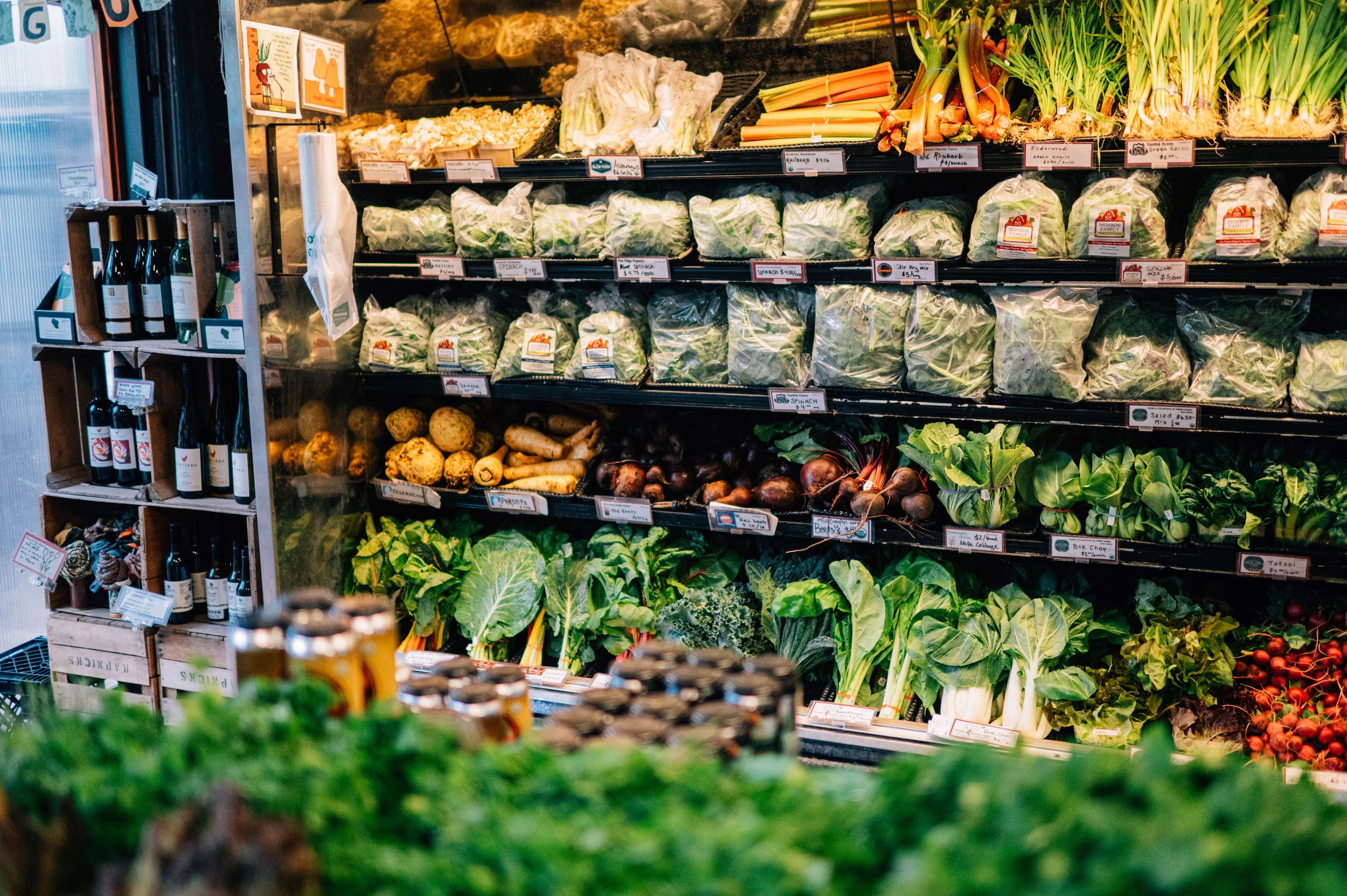 A wall of produce at Argus