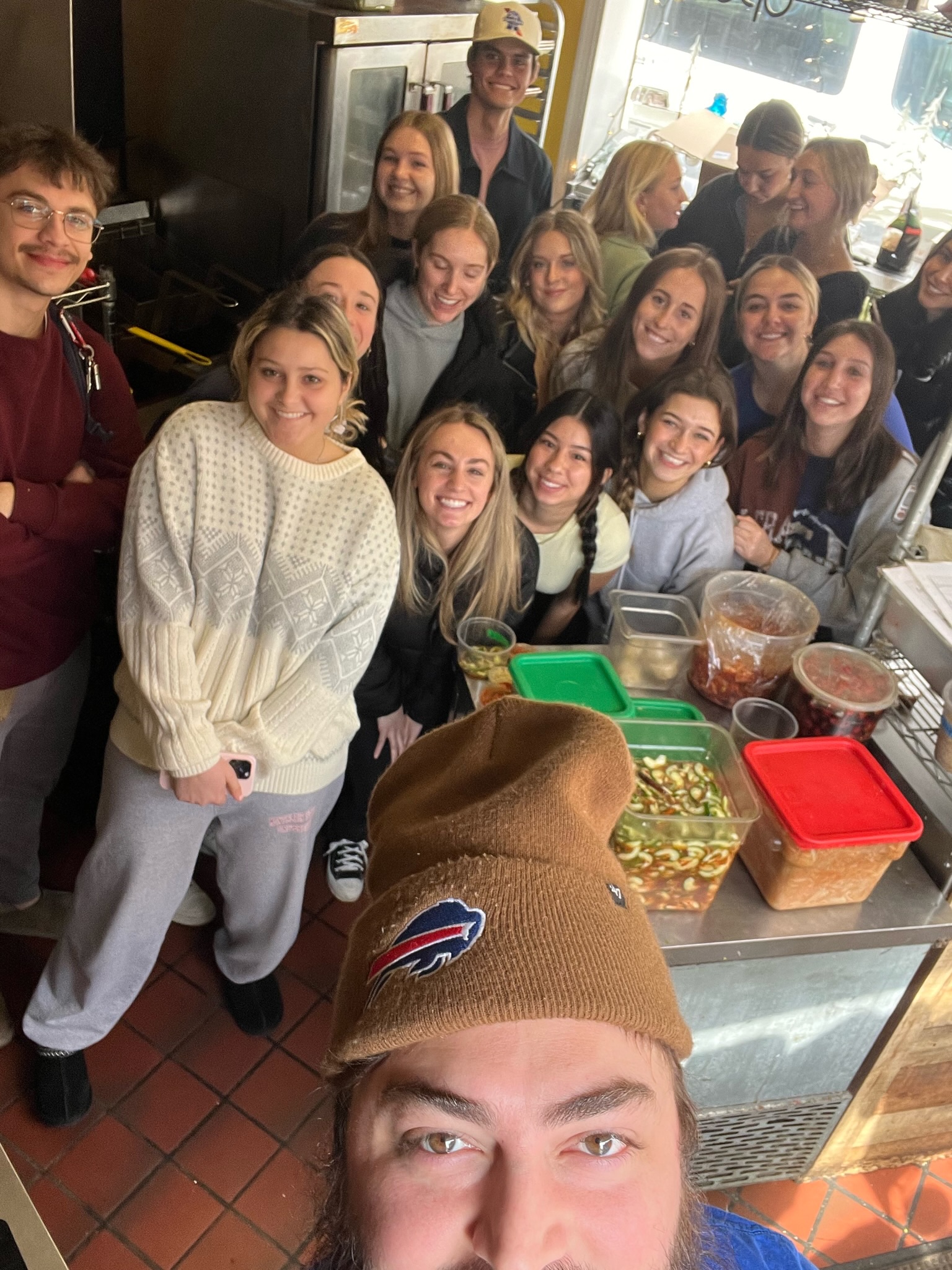 A selfie with club members and Side Biscuit chef